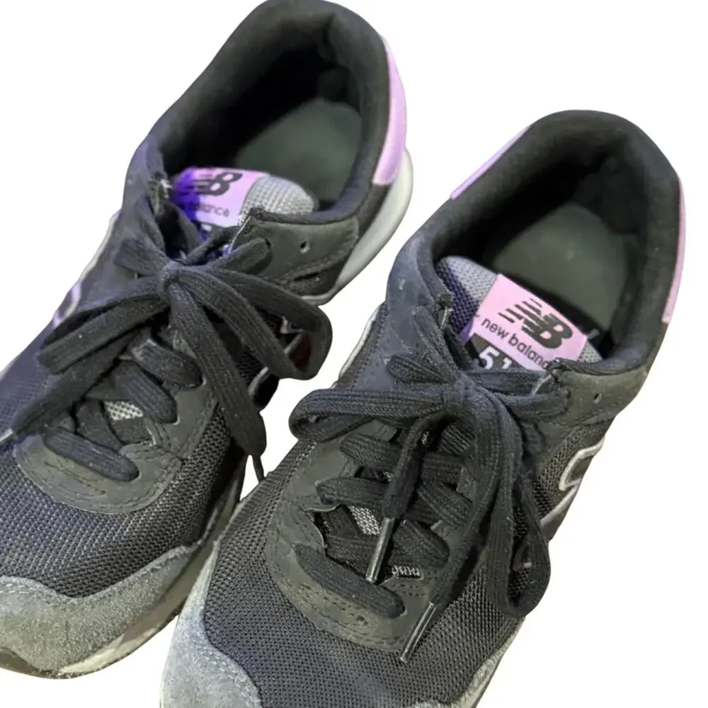 New balance 515 sneakers in black, grey, and purple tongue labels
